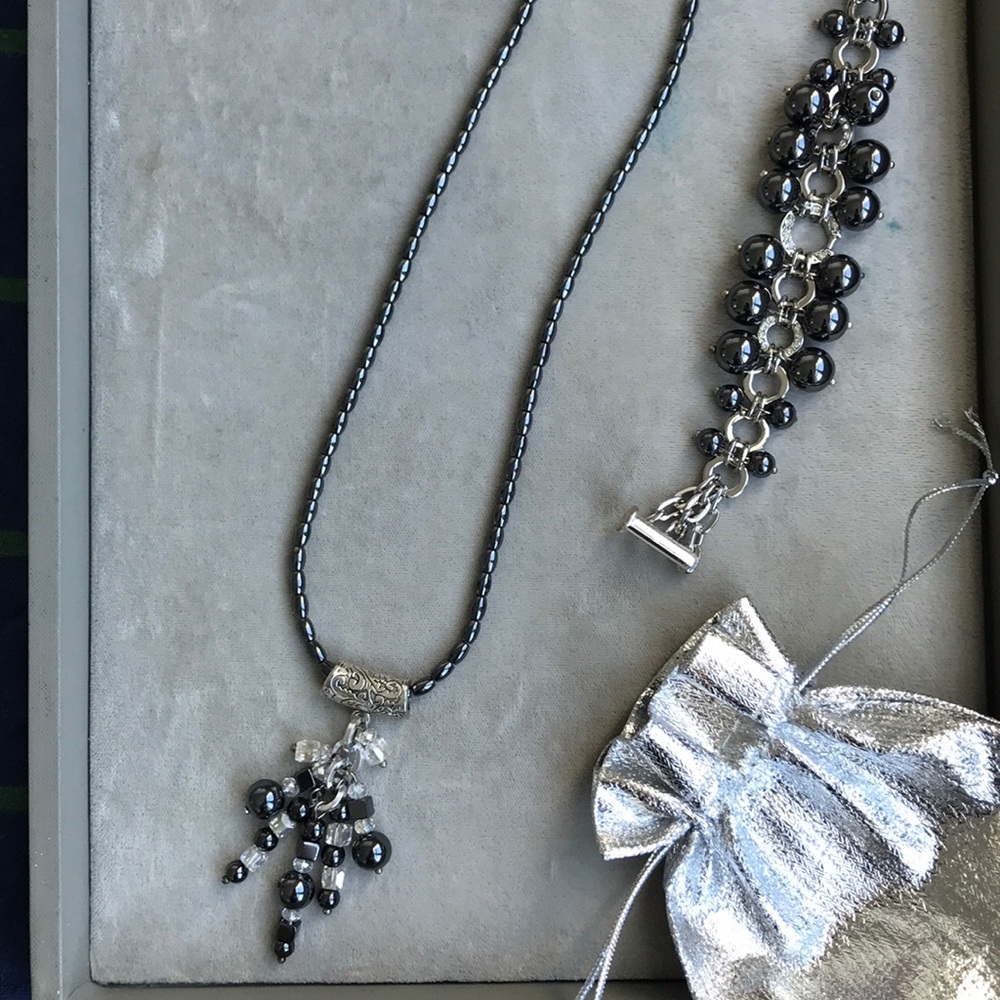 Charm bracelet and necklace bundle in Hema…